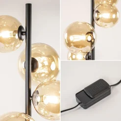 Art Deco vloerlamp zwart met amber glazen bollen