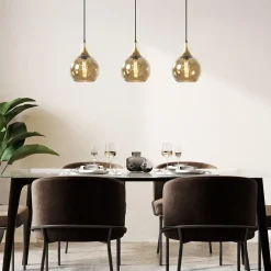 Chique 3-lichts hanglamp zwart/goud met amber glas