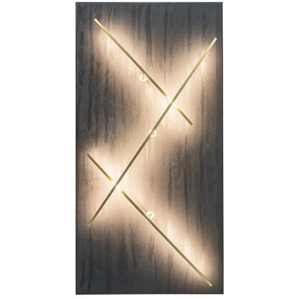 Grote design wandlamp met gouden kapjes