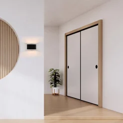 Moderne kleine wandlamp ovaal zwart