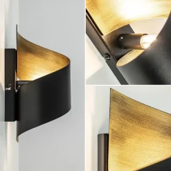 Sierlijke wandlamp krul zwart met goud