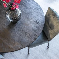 Stoffen eetkamerstoel met zwarte poot en wieltjes