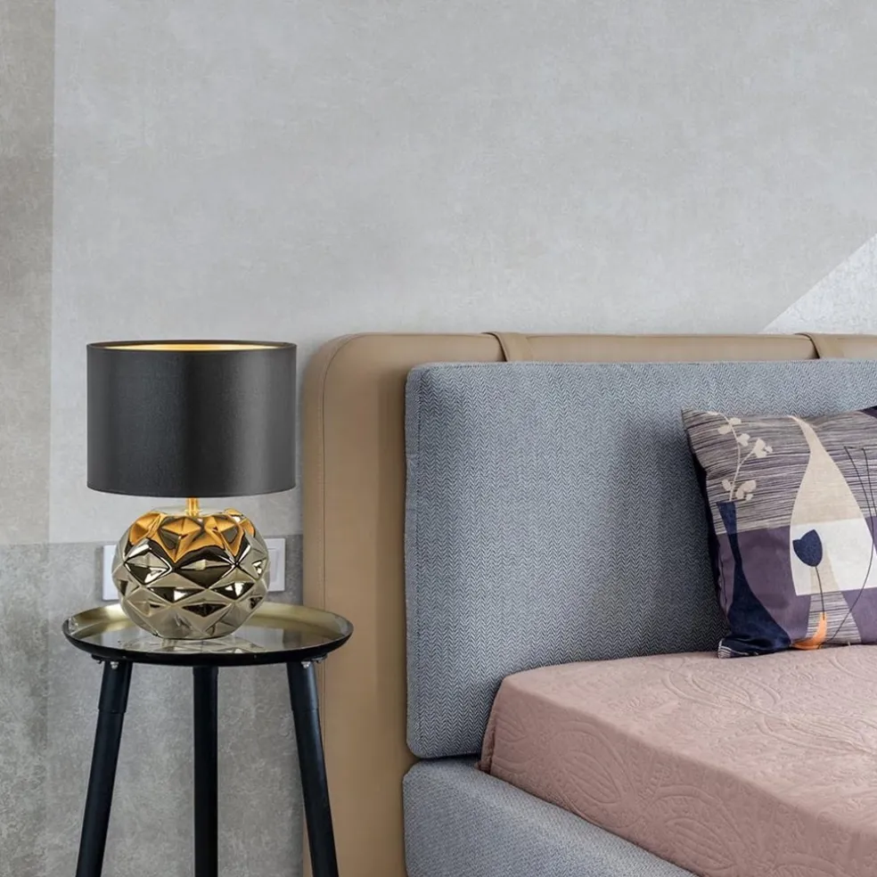 Trendy tafellamp keramiek goud met zwarte kap