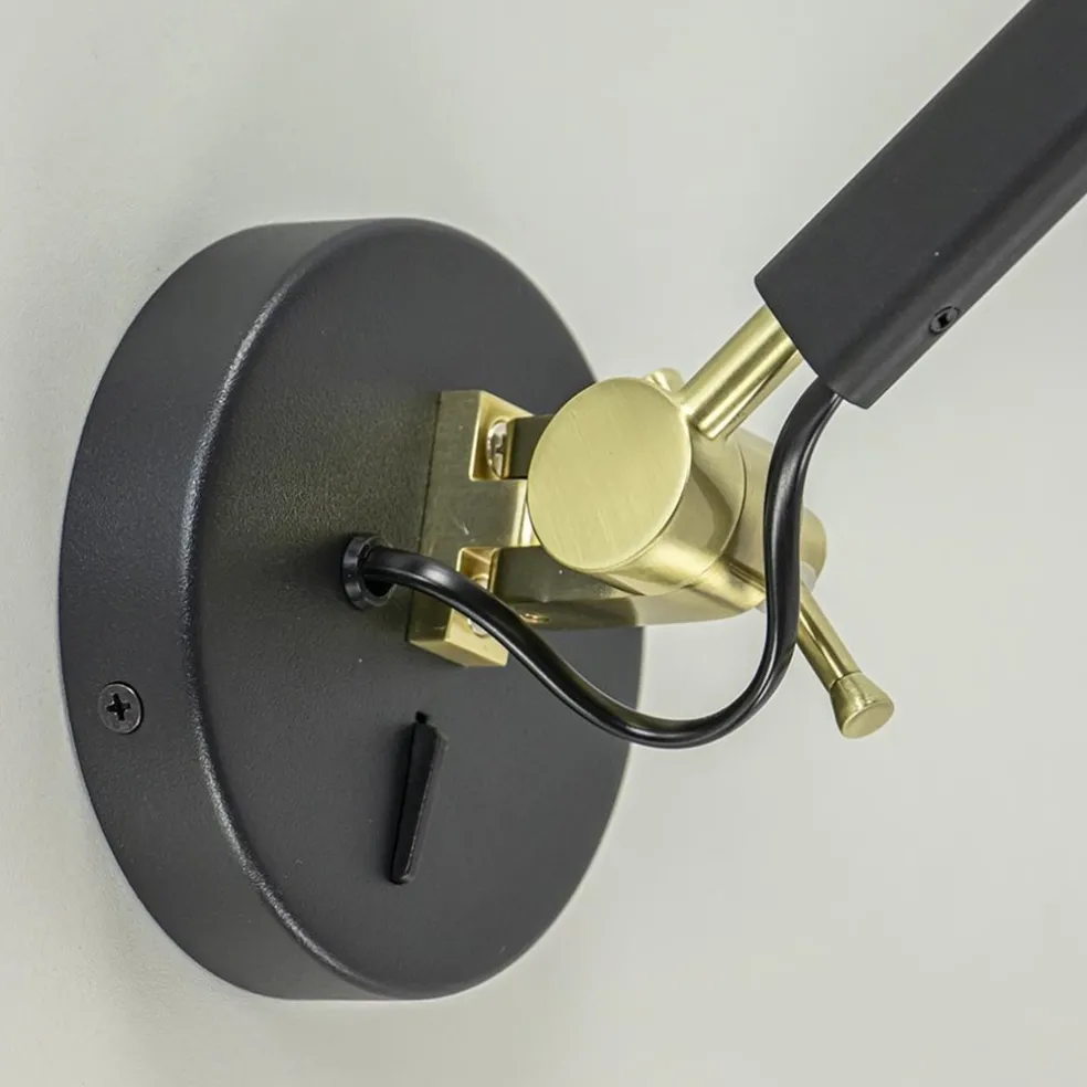 Verstelbare wandlamp mat zwart met gouden details